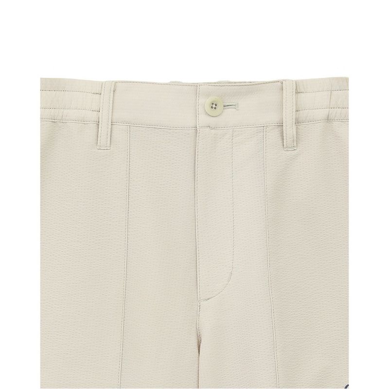 TRAVISMATHEW パンツ メンズ ベージュ