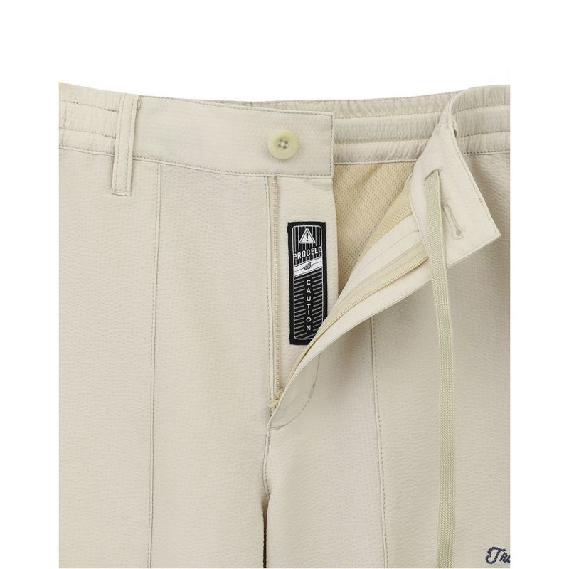 TRAVISMATHEW パンツ メンズ ベージュ