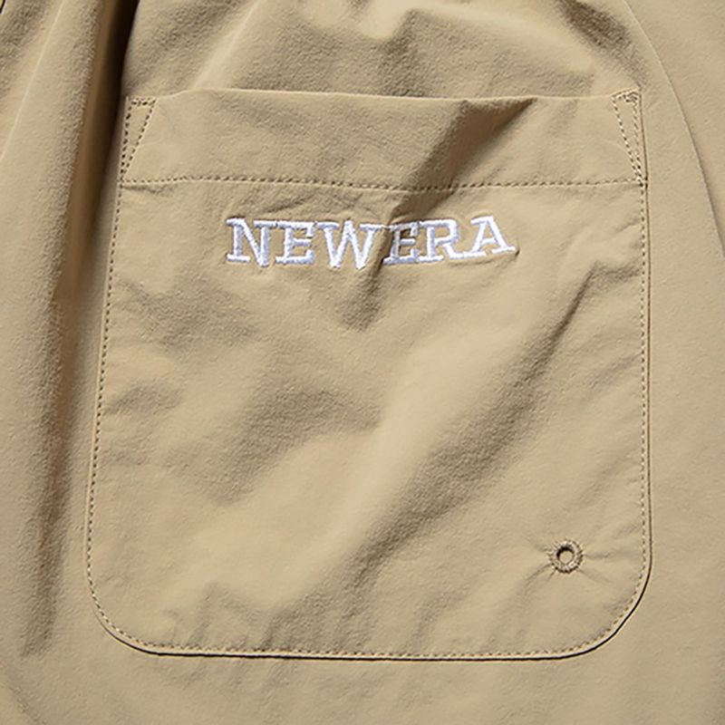 NEW ERA メンズ パンツ カーキ