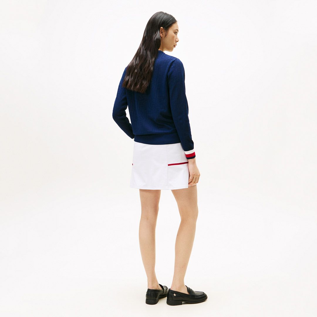 TOMMY HILFIGER GOLF レディース 長袖ニット ネイビー モデル着用画像