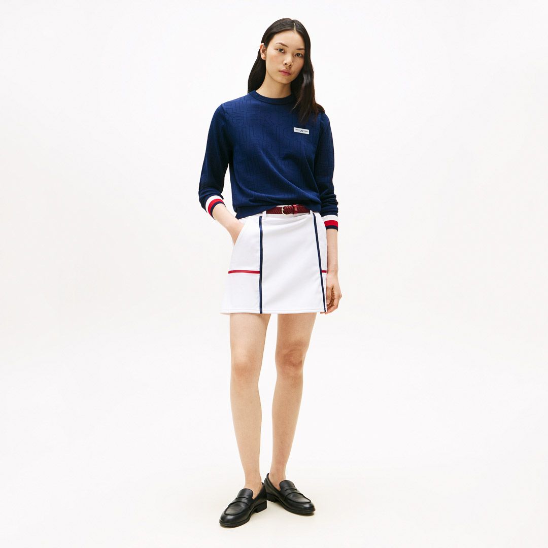TOMMY HILFIGER GOLF レディース 長袖ニット ネイビー モデル着用画像